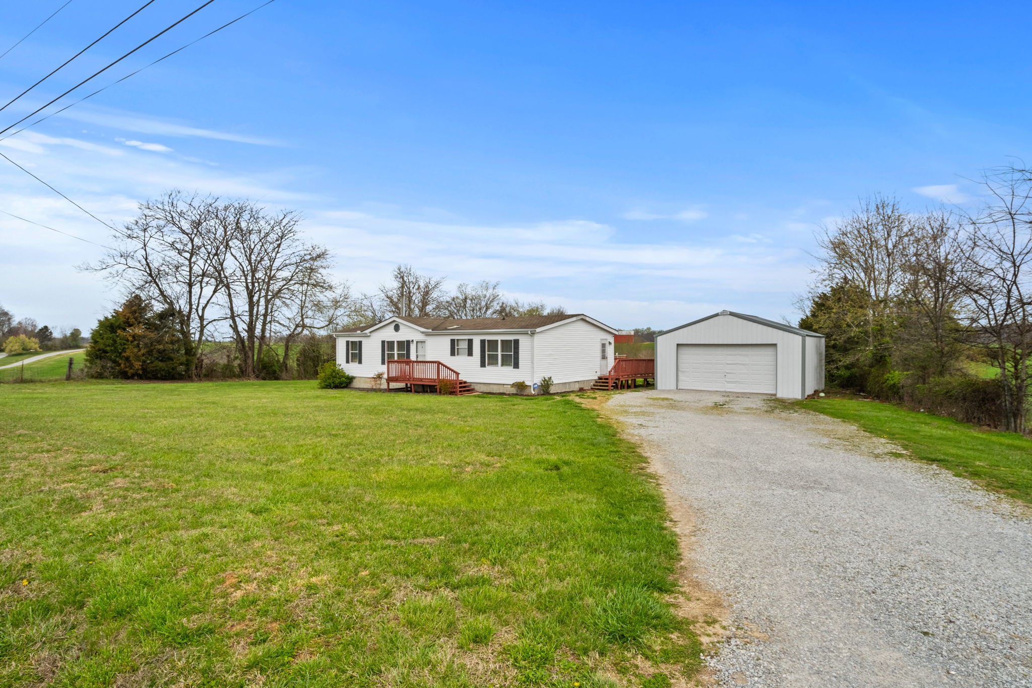 1848 Mint Springs Road Adams, TN 37010 - Photo 5 of 36 a front view of house with yard and green space