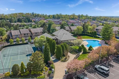 an aerial view of a house with a garden