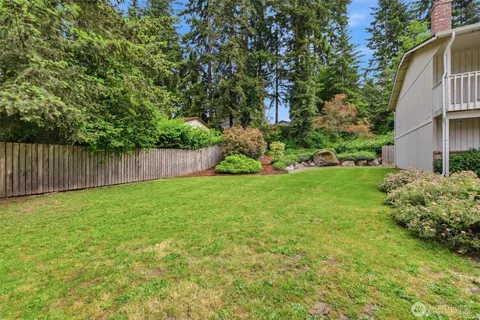 a view of a backyard with a garden