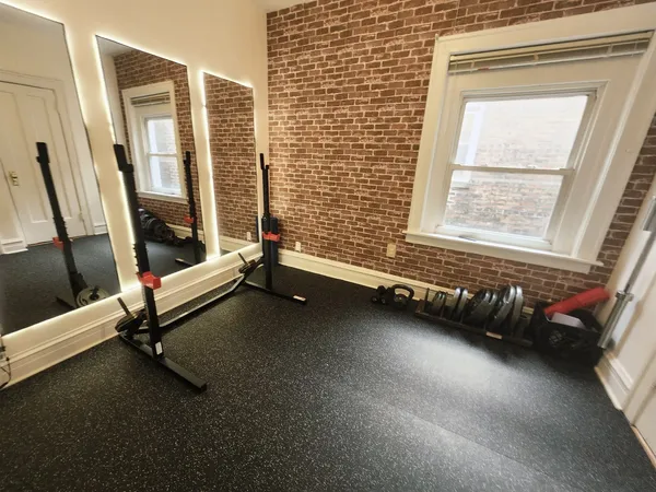 a view of a room with gym equipment