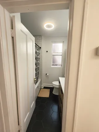 a bathroom with a sink and mirror
