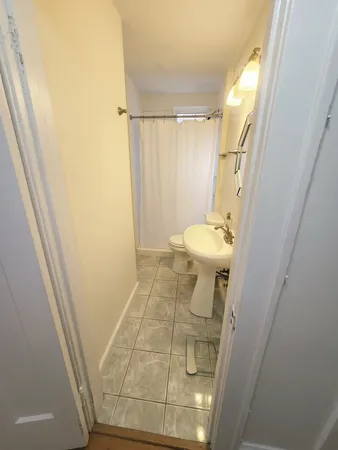 a bathroom with a sink and mirror