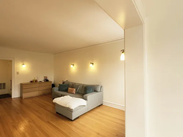 a living room with furniture and a table