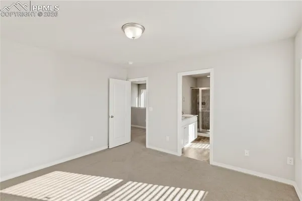 a view of a room with a hallway