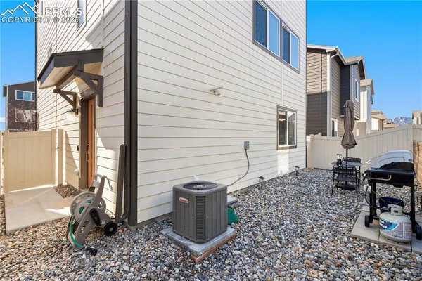 a view of a back yard of the house