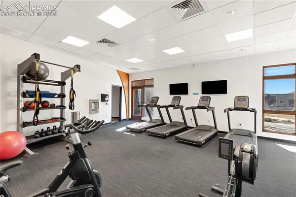 a view of a room with gym equipment