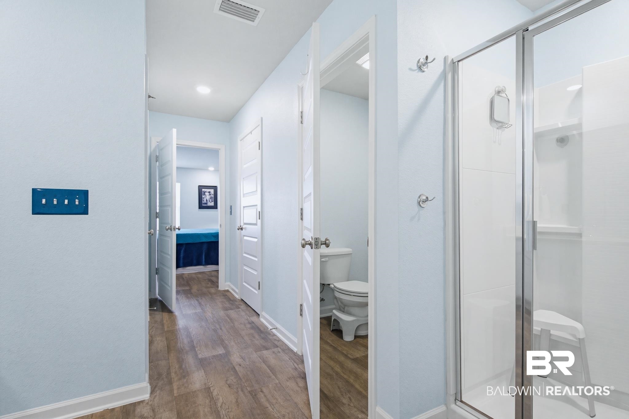 261 Fulham Lane Foley, AL 36535 - Photo 38 of 50 Full bathroom with a stall shower and dark wood finished floors