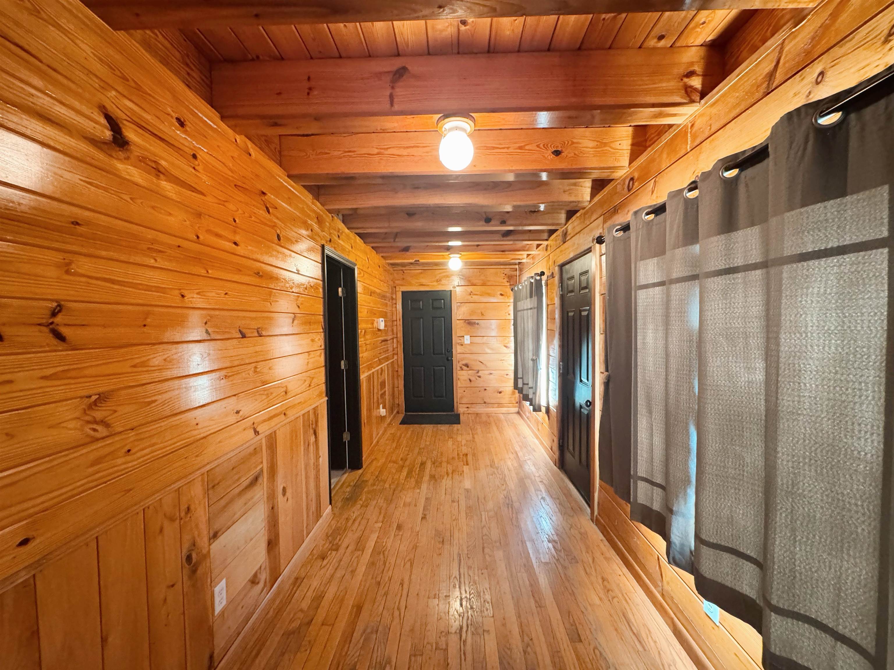112 York Commons Ripley, TN 38063 - Photo 21 of 29 a view of a hallway with wooden floor