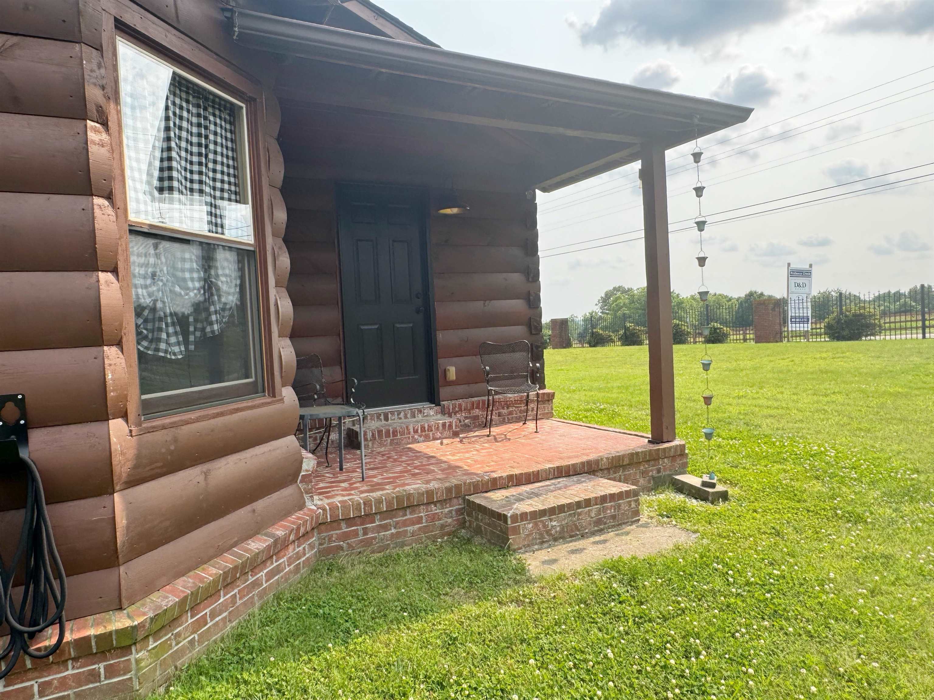 112 York Commons Ripley, TN 38063 - Photo 26 of 29 a backyard of a house with sofas table and chairs