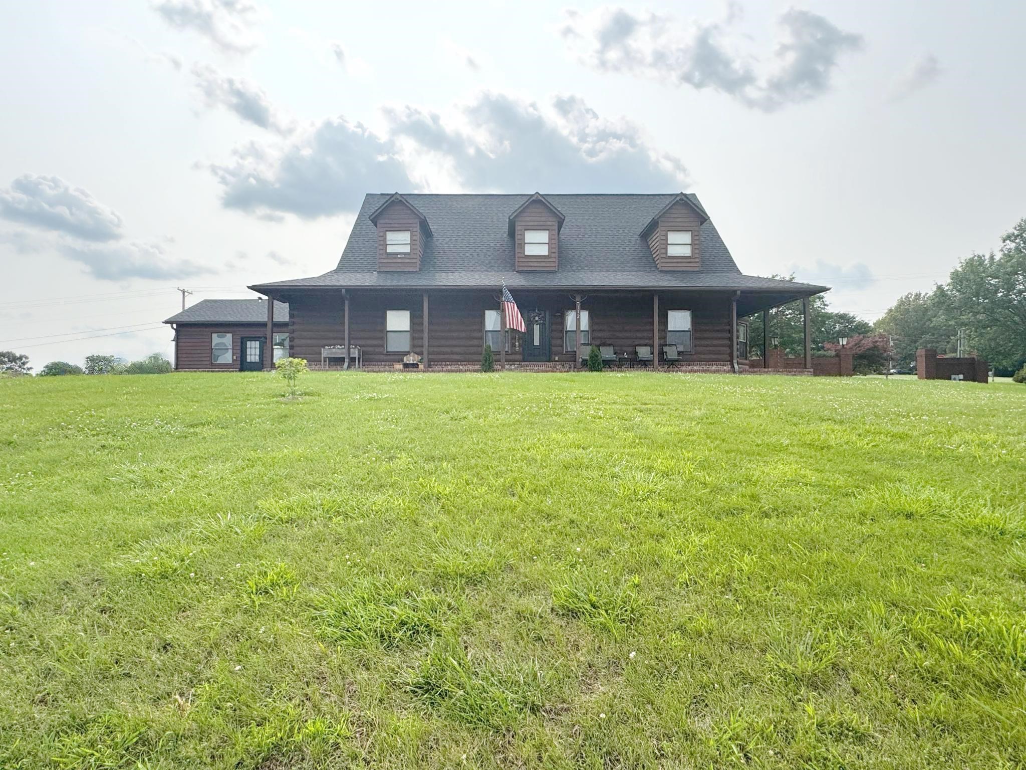 112 York Commons Ripley, TN 38063 - Photo 3 of 29 a front view of a house with a garden