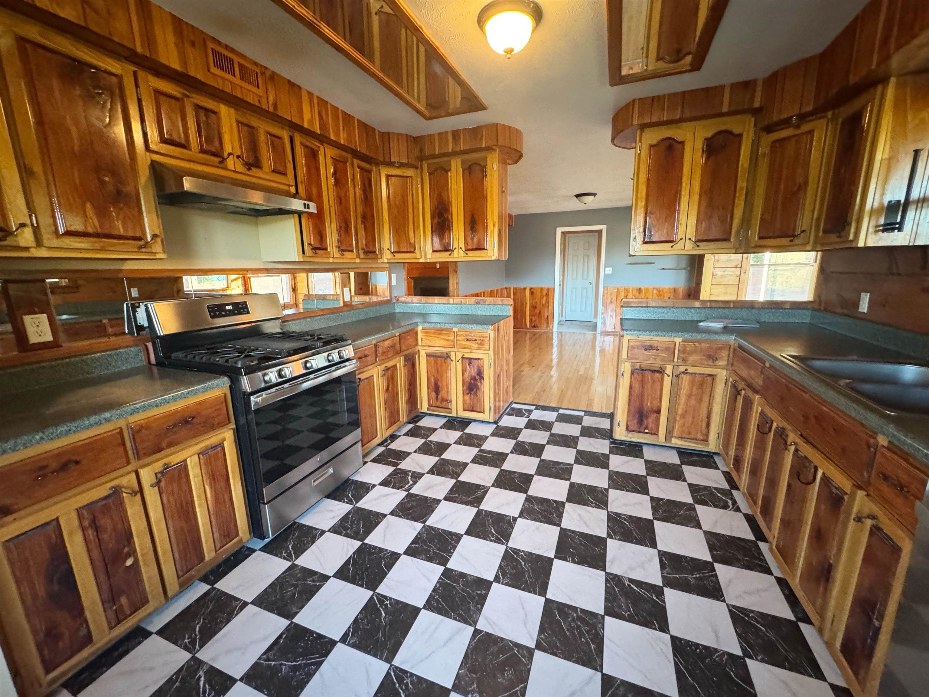 112 York Commons Ripley, TN 38063 - Photo 9 of 29 a kitchen with stainless steel appliances granite countertop a sink stove and refrigerator