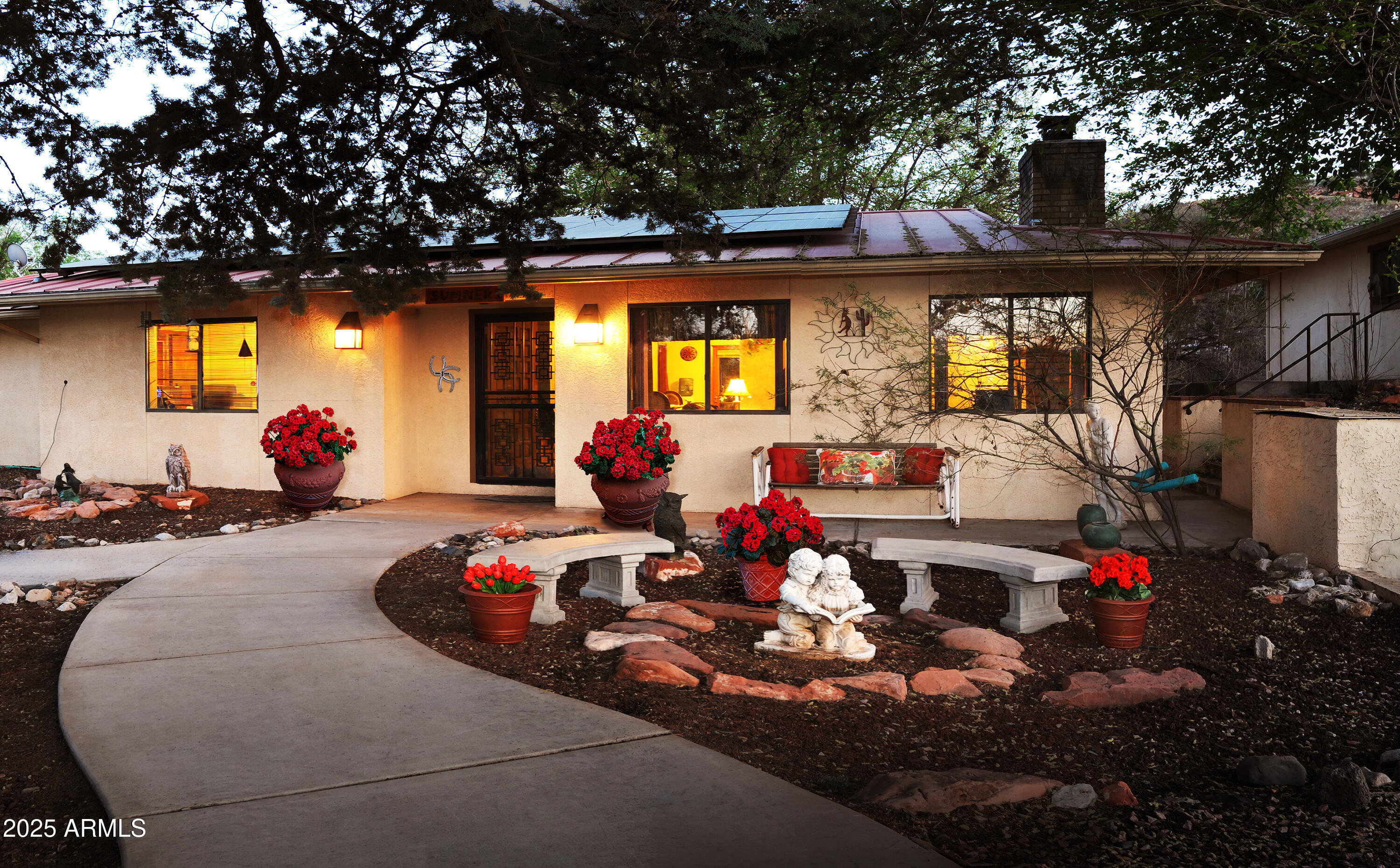 a view of a chairs and table in a patio