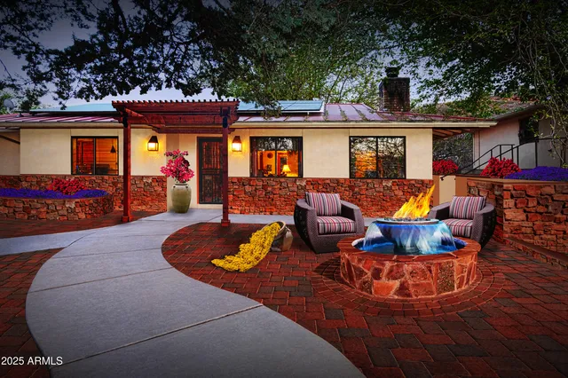 a view of a chairs and tables in the patio