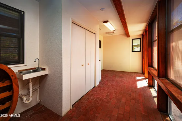 a view of a glass door with a balcony