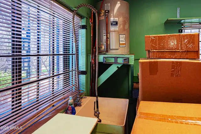 a picture of a bathroom with a shower