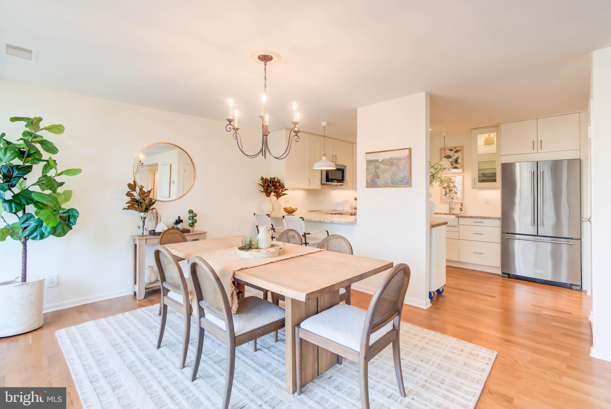 4936 Sentinel Drive, Unit 302 Bethesda, MD 20816 - Photo 12 of 52 Dining Room Flows into Renovated Kitchen