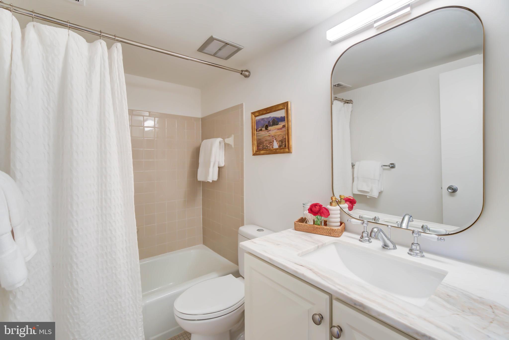 4936 Sentinel Drive, Unit 302 Bethesda, MD 20816 - Photo 29 of 52 Primary Bath w Updated Vanity, Lighting & Fixtures