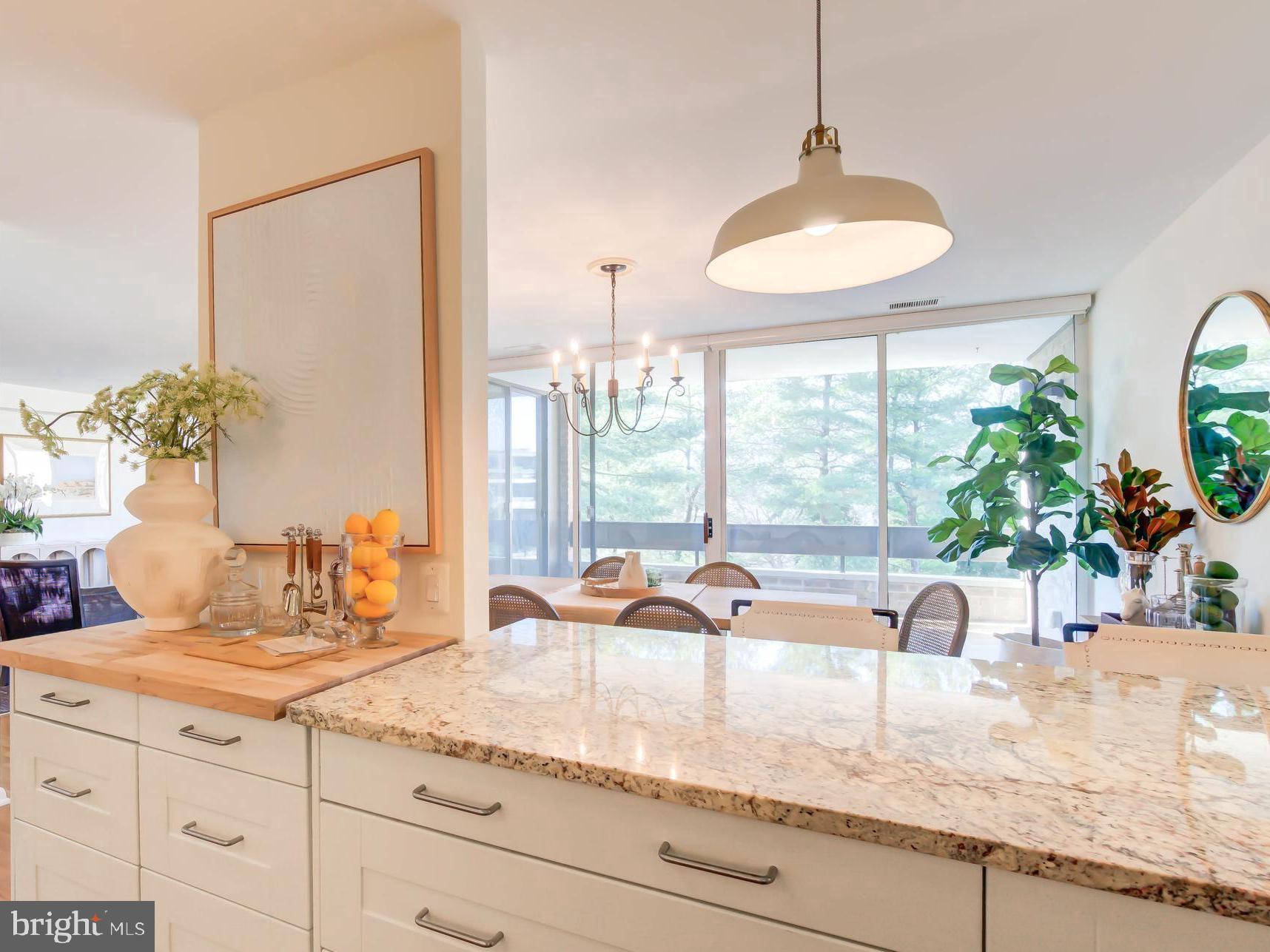 4936 Sentinel Drive, Unit 302 Bethesda, MD 20816 - Photo 2 of 52 Renovated Kitchen w/ Open Breakfast Bar