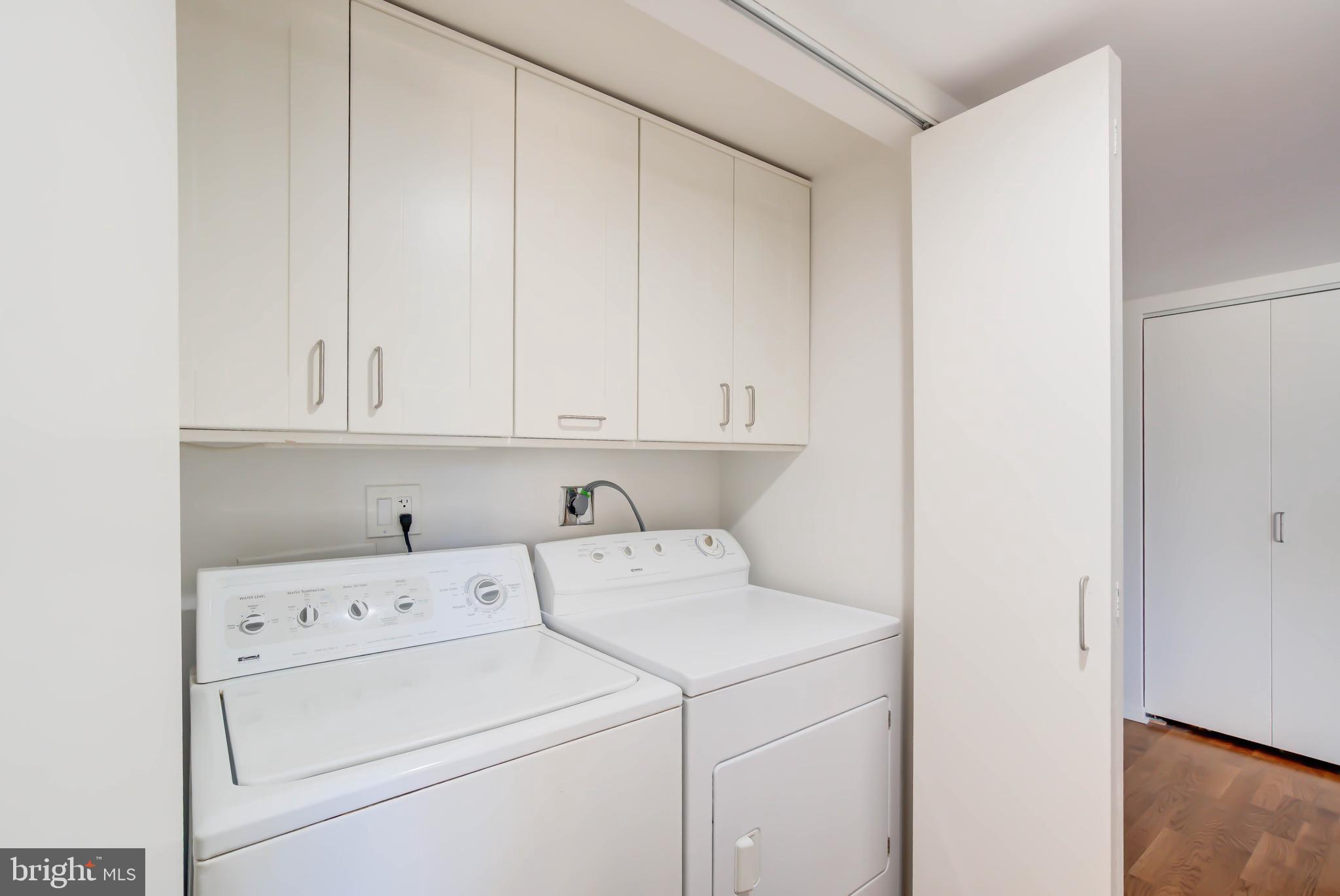 4936 Sentinel Drive, Unit 302 Bethesda, MD 20816 - Photo 39 of 52 Side by Side Washer/Dryer in Laundry Area