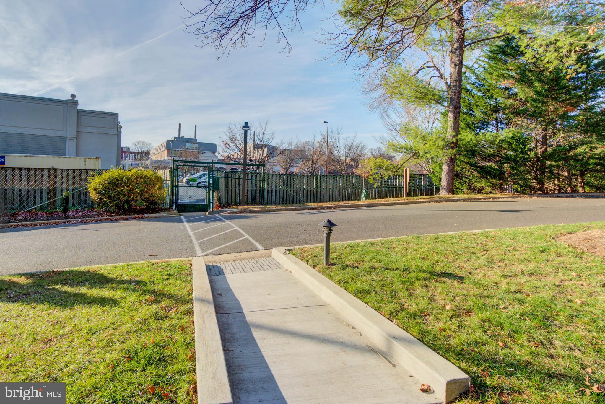 4936 Sentinel Drive, Unit 302 Bethesda, MD 20816 - Photo 48 of 52 Gate to The Shops at Sumner Place Right in Front!