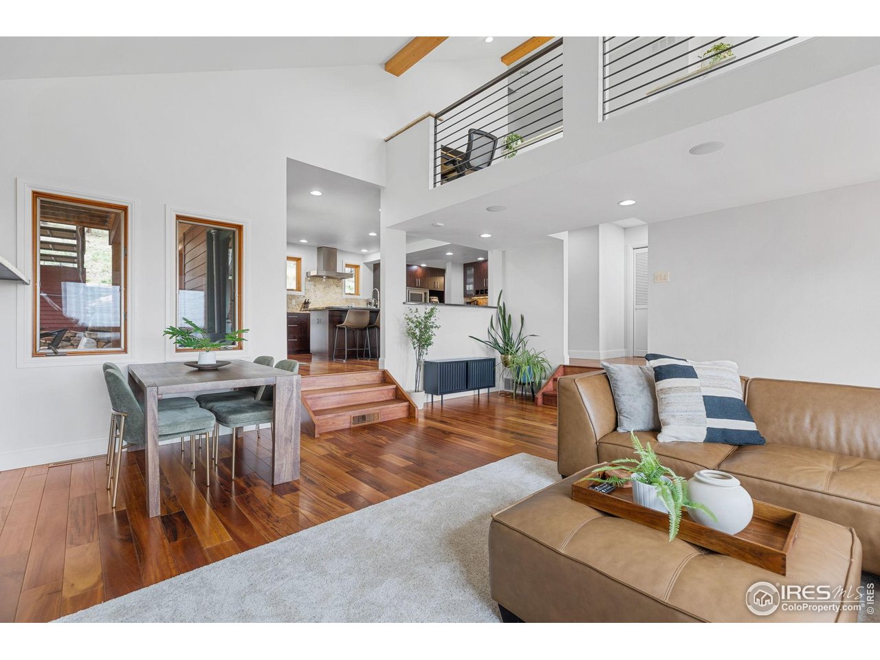 8543 Middle Fork Road Boulder, CO 80302 - Photo 11 of 48 a living room with furniture and a wooden floor