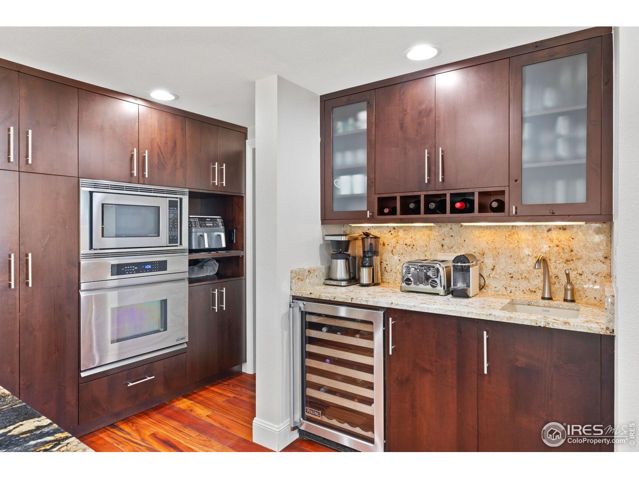 8543 Middle Fork Road Boulder, CO 80302 - Photo 18 of 48 a kitchen with stainless steel appliances granite countertop a refrigerator and a stove top oven