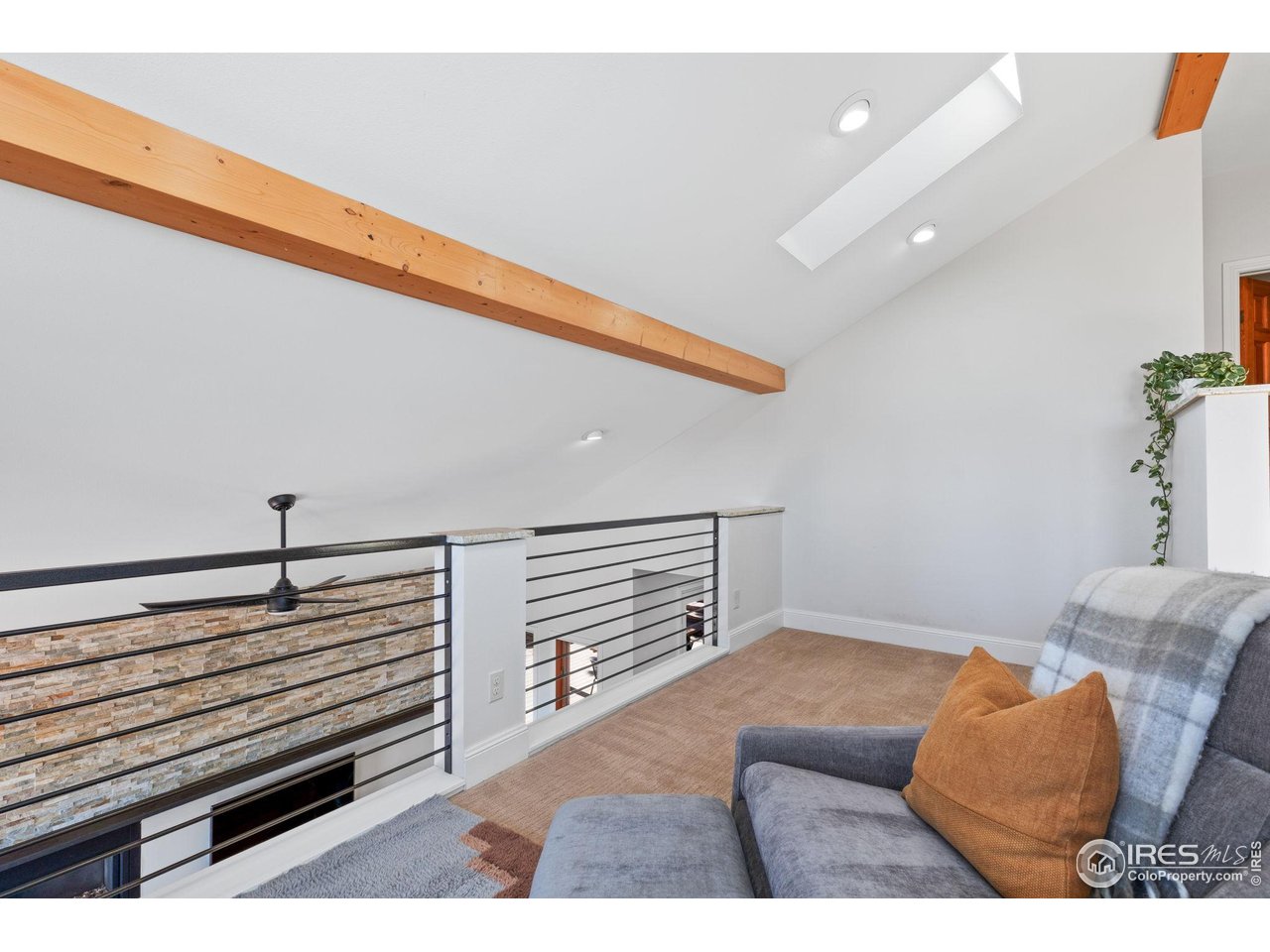 8543 Middle Fork Road Boulder, CO 80302 - Photo 26 of 48 a view of room with furniture and wooden floor