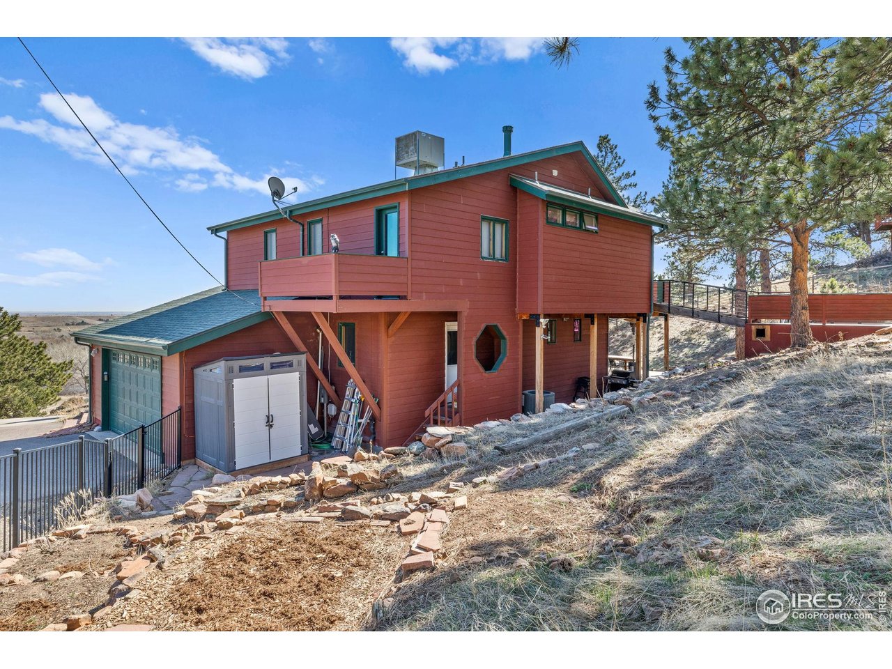 8543 Middle Fork Road Boulder, CO 80302 - Photo 42 of 48 a view of a house with a yard