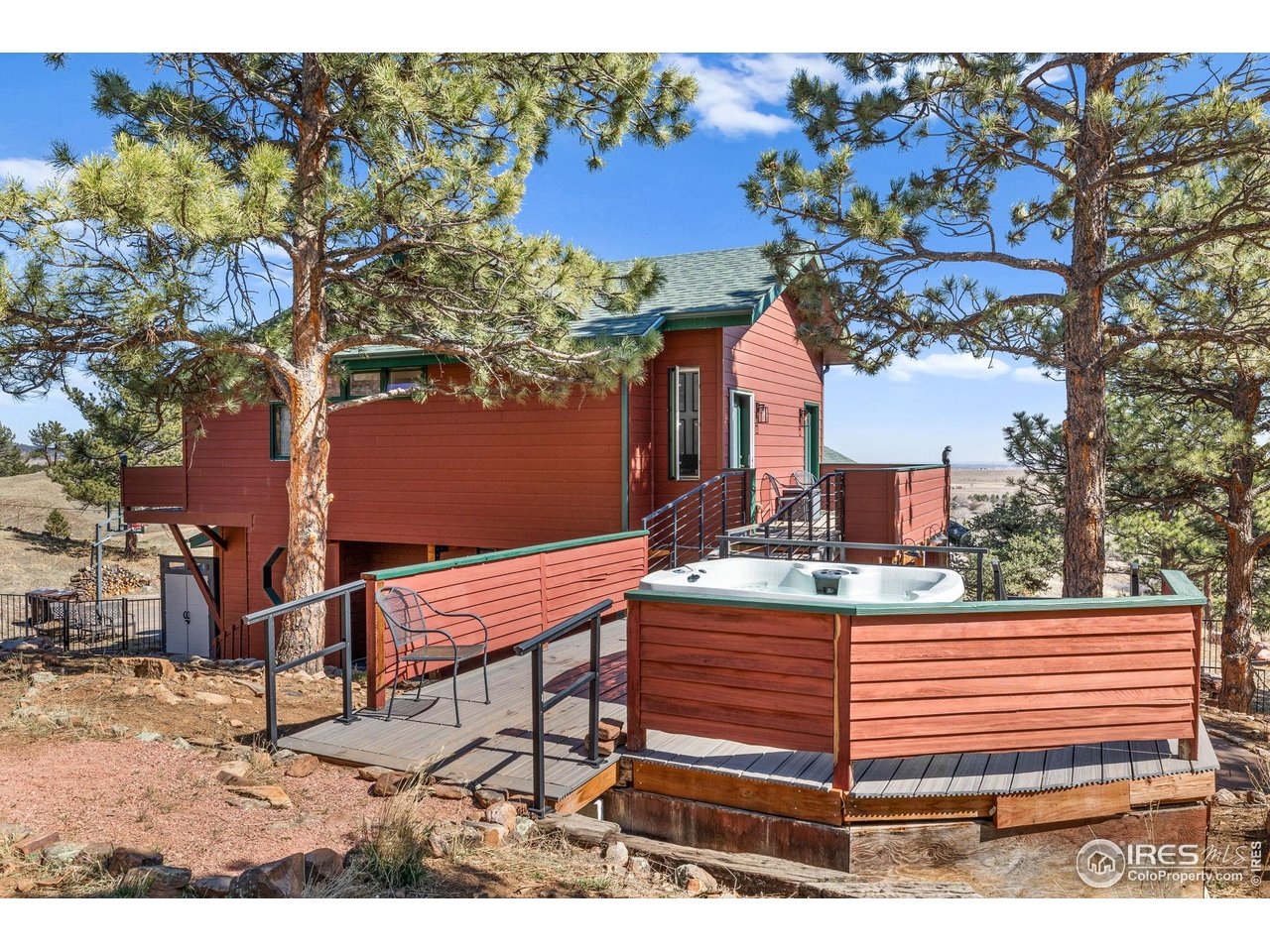 8543 Middle Fork Road Boulder, CO 80302 - Photo 44 of 48 a view of a chairs and table on the wooden floor