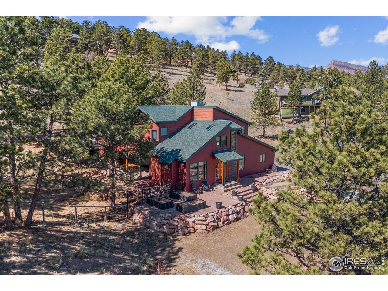 8543 Middle Fork Road Boulder, CO 80302 - Photo 48 of 48 a view of a house with a yard