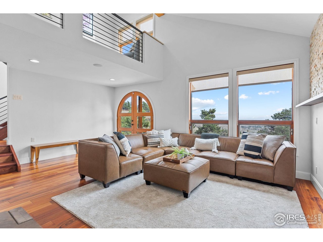 8543 Middle Fork Road Boulder, CO 80302 - Photo 7 of 48 a living room with furniture and a large window