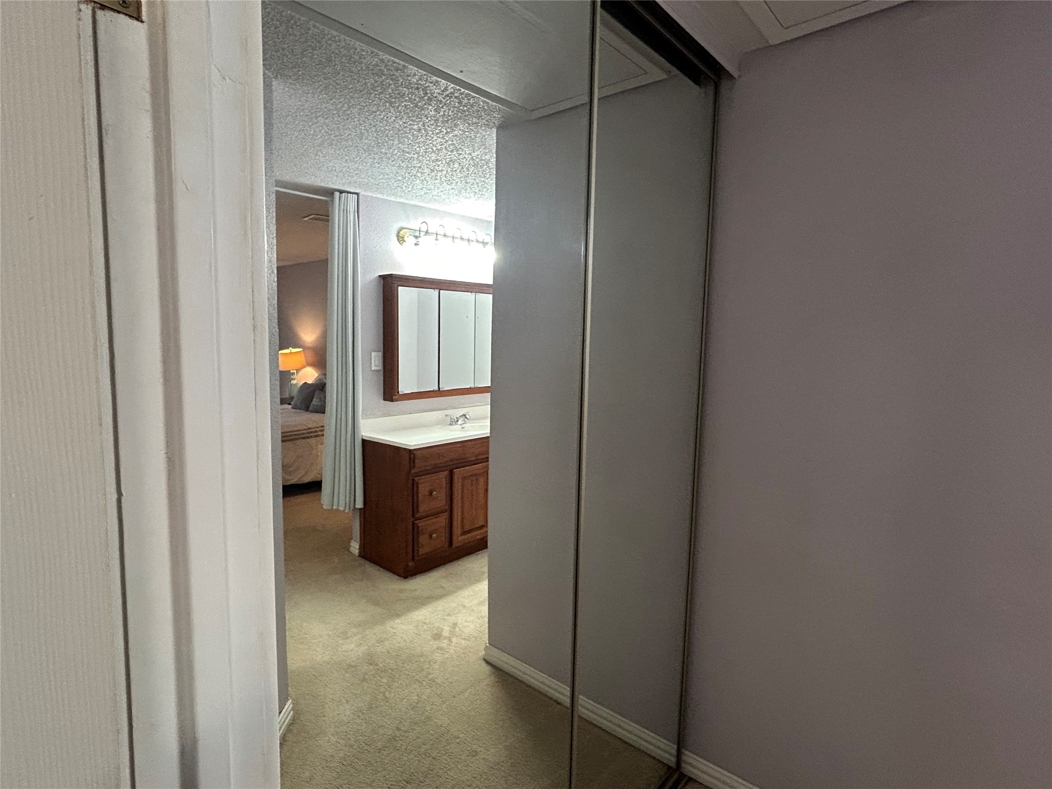 13034 Leader Street, Unit 965 Houston, TX 77072 - Photo 26 of 32 This second closet also features mirrored doors.