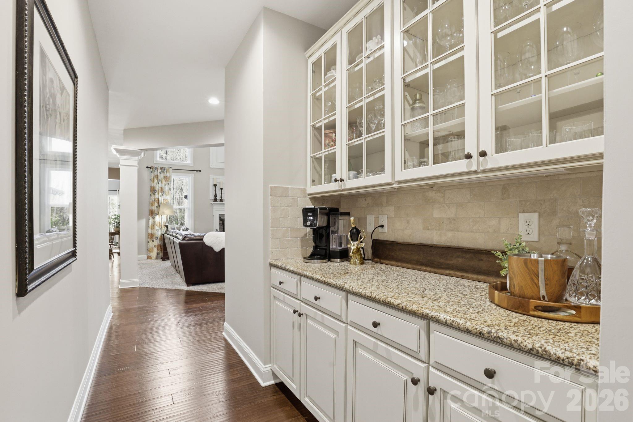 215 Streamwood Road Troutman, NC 28166 - Photo 12 of 48 a view of a kitchen with a sink and wooden floor