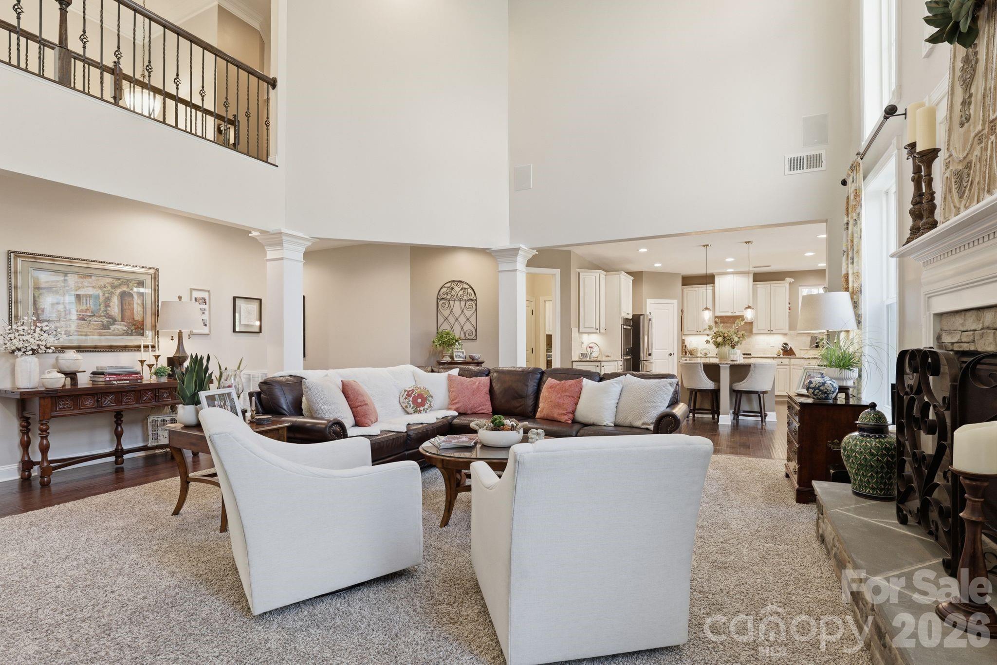 215 Streamwood Road Troutman, NC 28166 - Photo 14 of 48 a living room with furniture and a fireplace