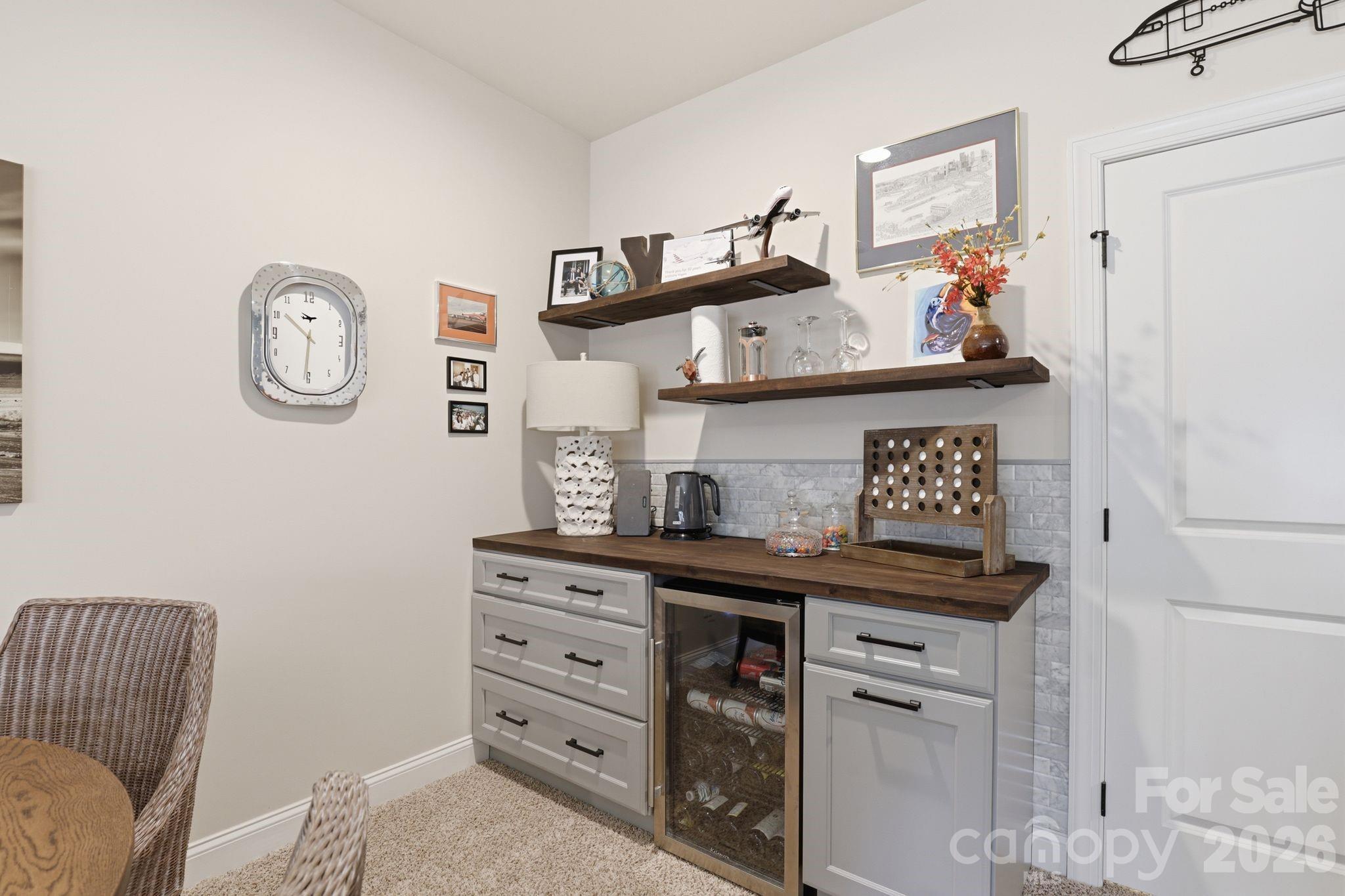 215 Streamwood Road Troutman, NC 28166 - Photo 30 of 48 a living room with furniture and a table