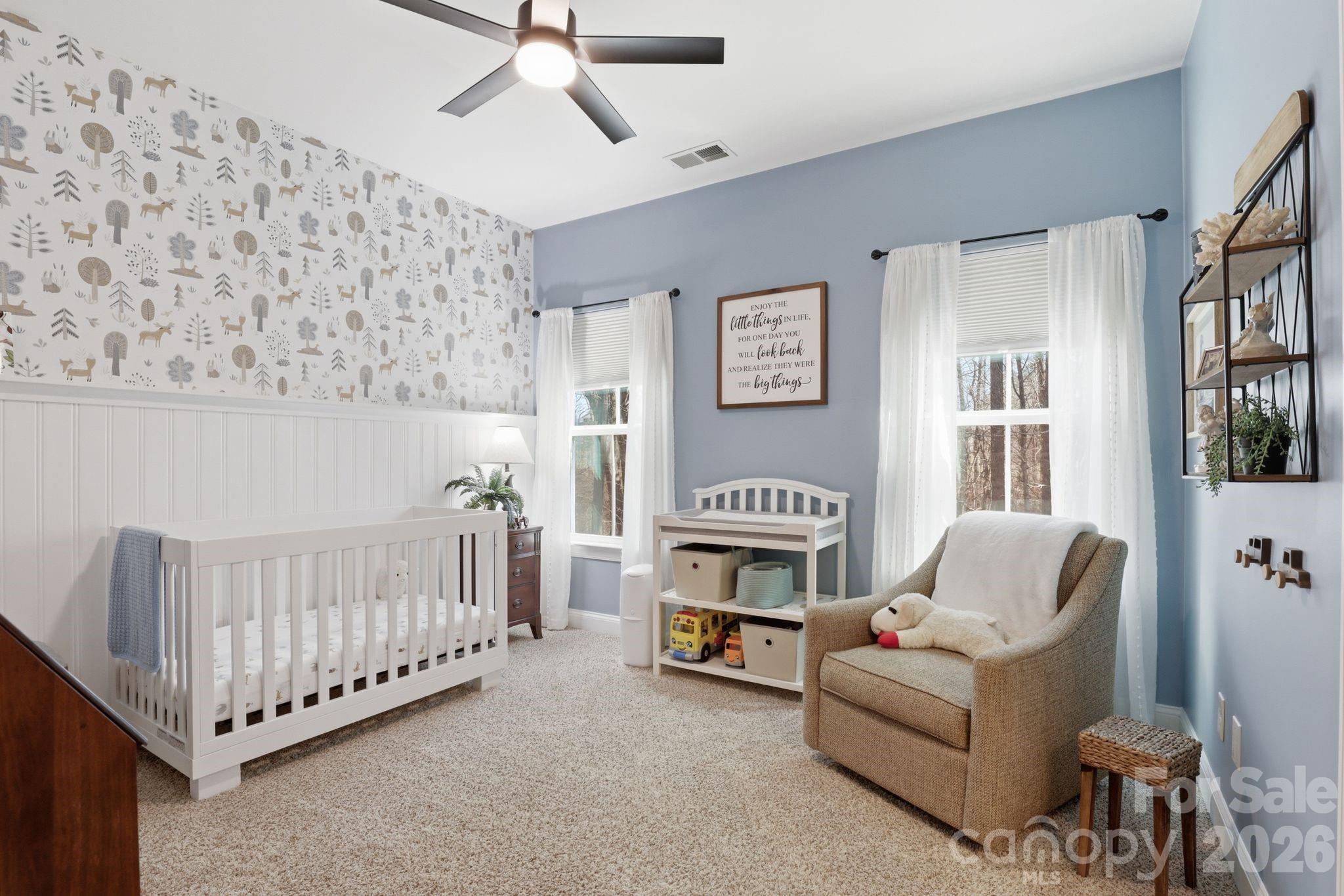 215 Streamwood Road Troutman, NC 28166 - Photo 38 of 48 a living room with furniture and a window