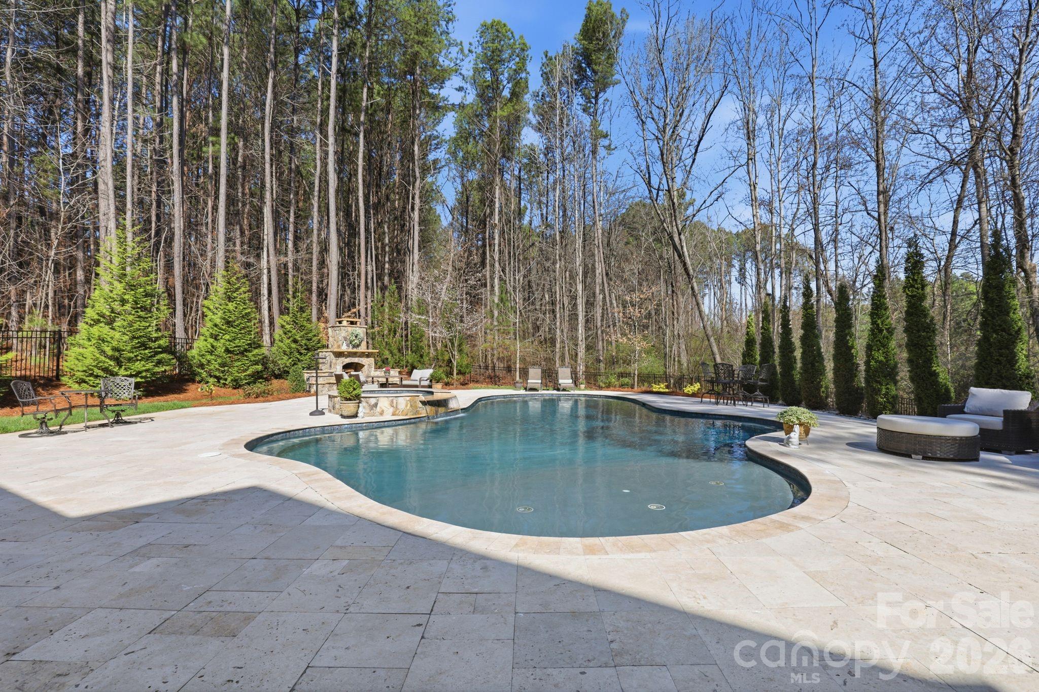 215 Streamwood Road Troutman, NC 28166 - Photo 41 of 48 a view of outdoor space with swimming pool and patio