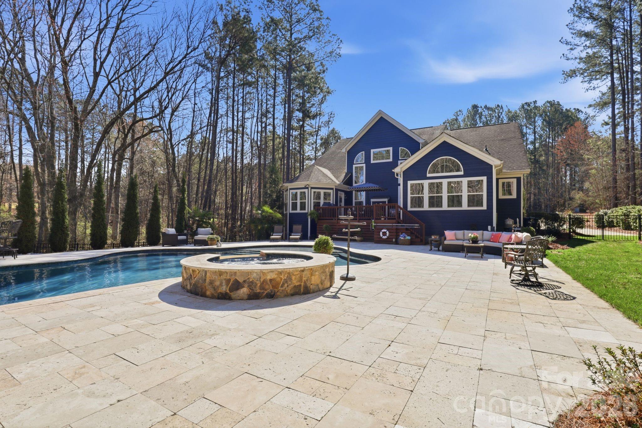 215 Streamwood Road Troutman, NC 28166 - Photo 43 of 48 a front view of a house with a yard