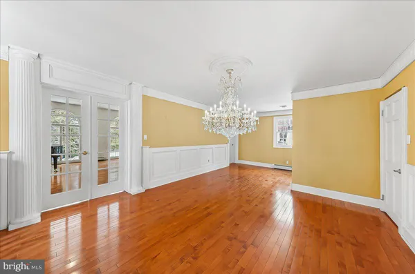 a view of a livingroom with wooden floor