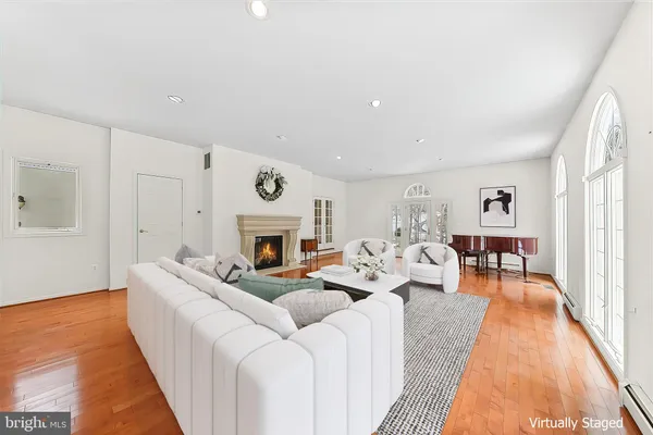 a living room with furniture and window