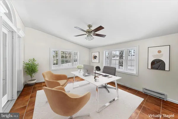 a kitchen with stainless steel appliances granite countertop a refrigerator a sink and a stove