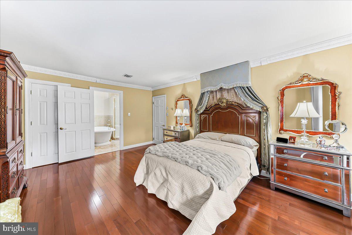 116 Deer Path Chadds Ford, PA 19317 - Photo 34 of 56 Primary bedroom with hardwood flooring