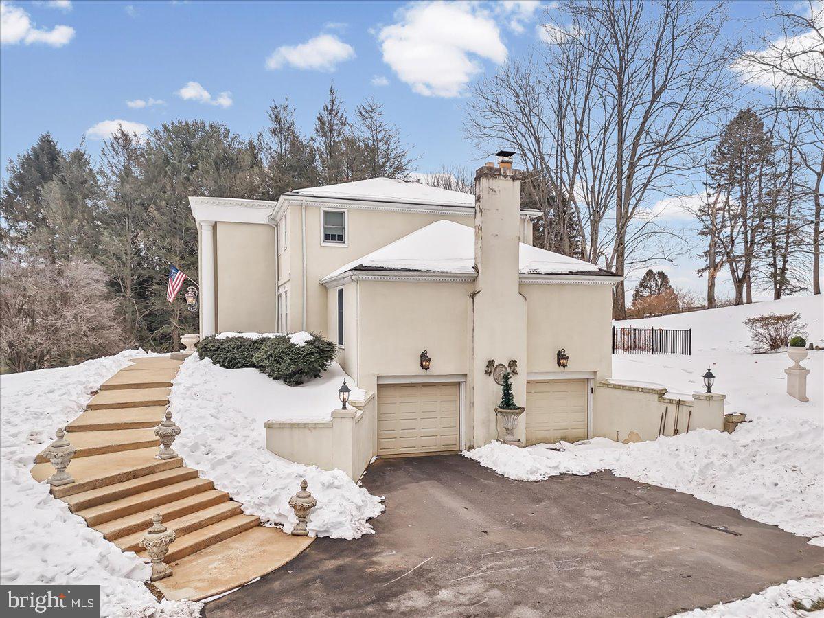 116 Deer Path Chadds Ford, PA 19317 - Photo 47 of 56 Two-car garage and walkway to the front door