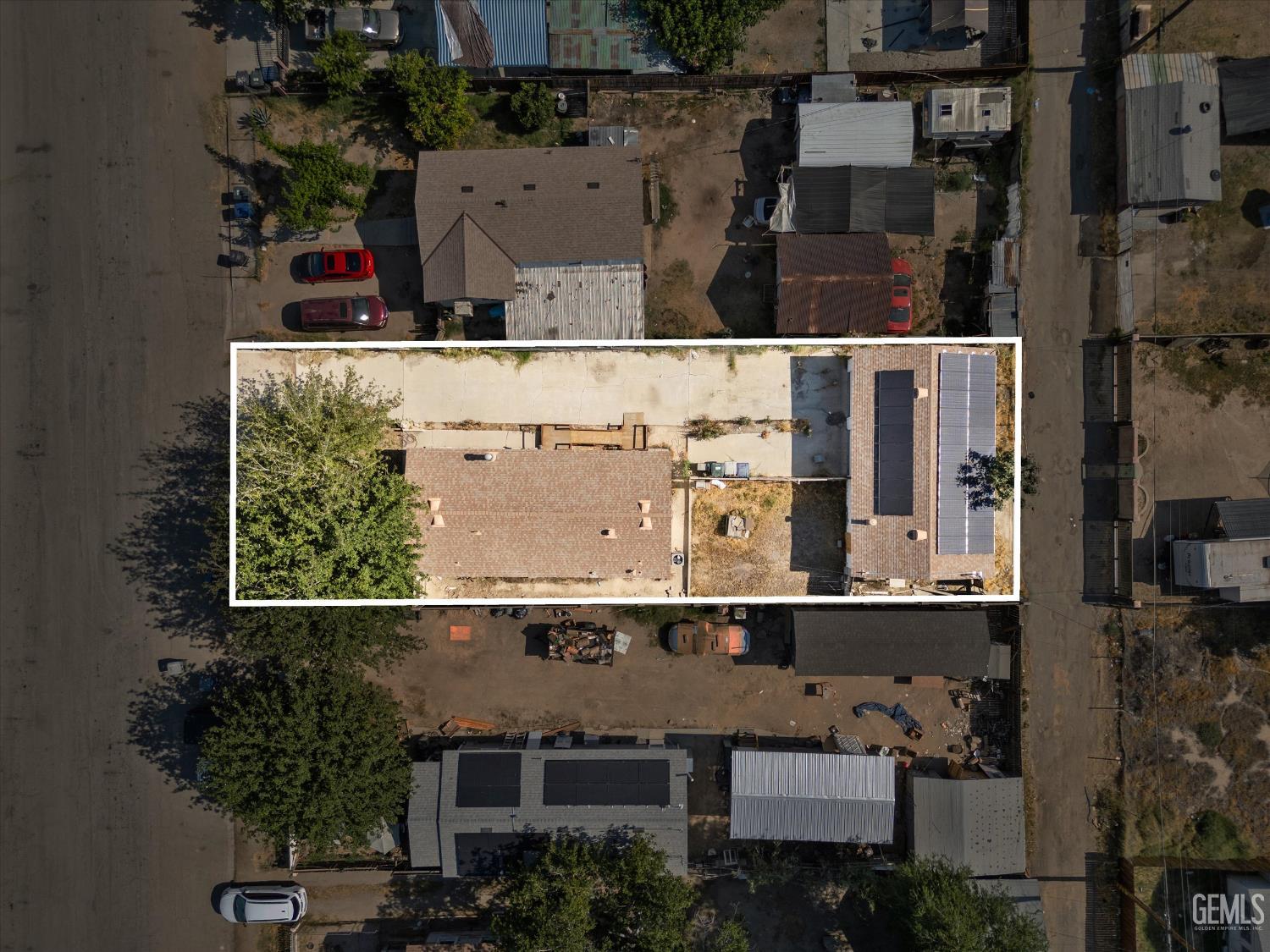 Undisclosed Address Taft, CA 93268 - Photo 4 of 8 an aerial view of residential houses with outdoor space