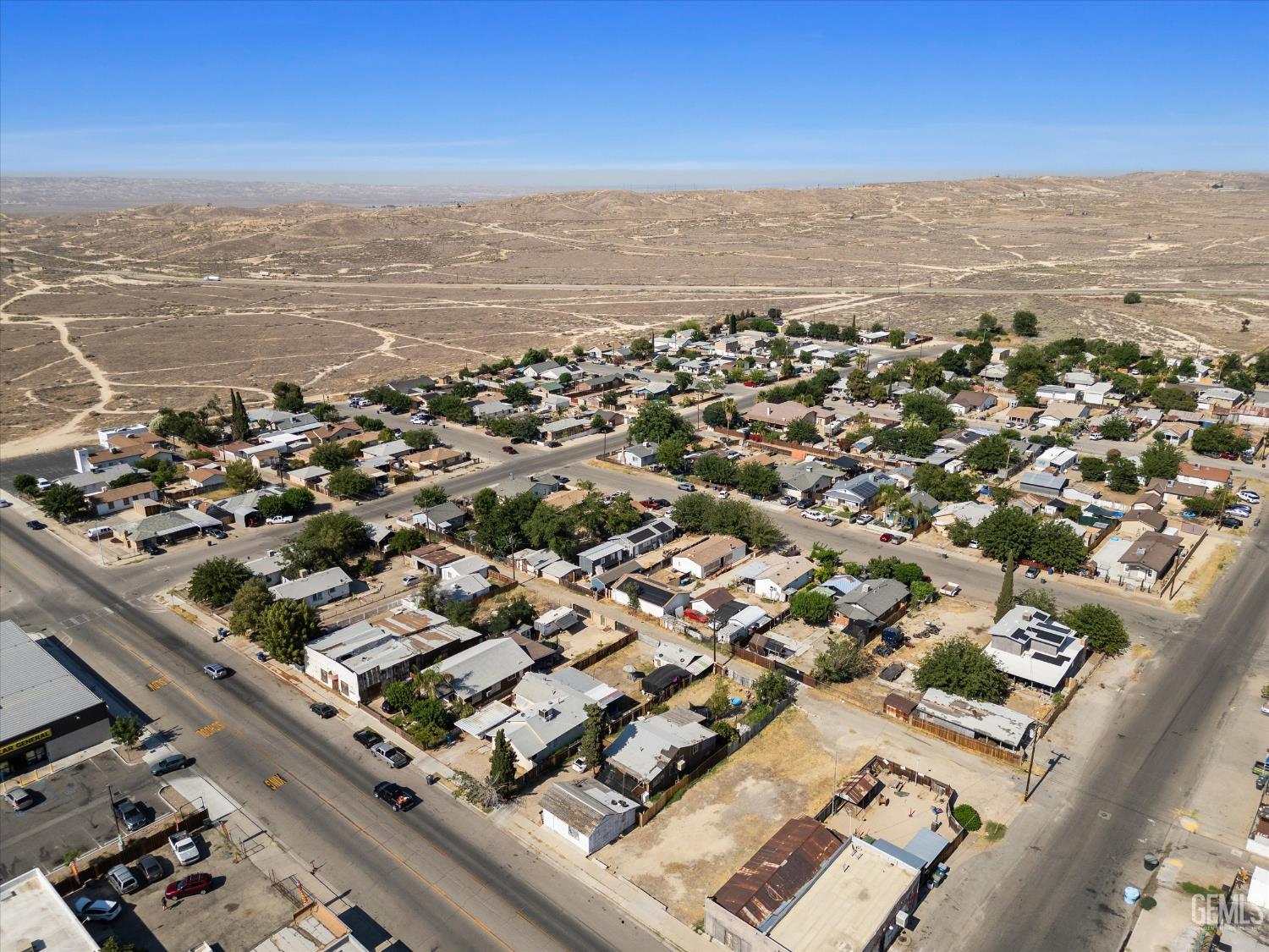 Undisclosed Address Taft, CA 93268 - Photo 8 of 8 an aerial view of ocean and residential houses with outdoor space