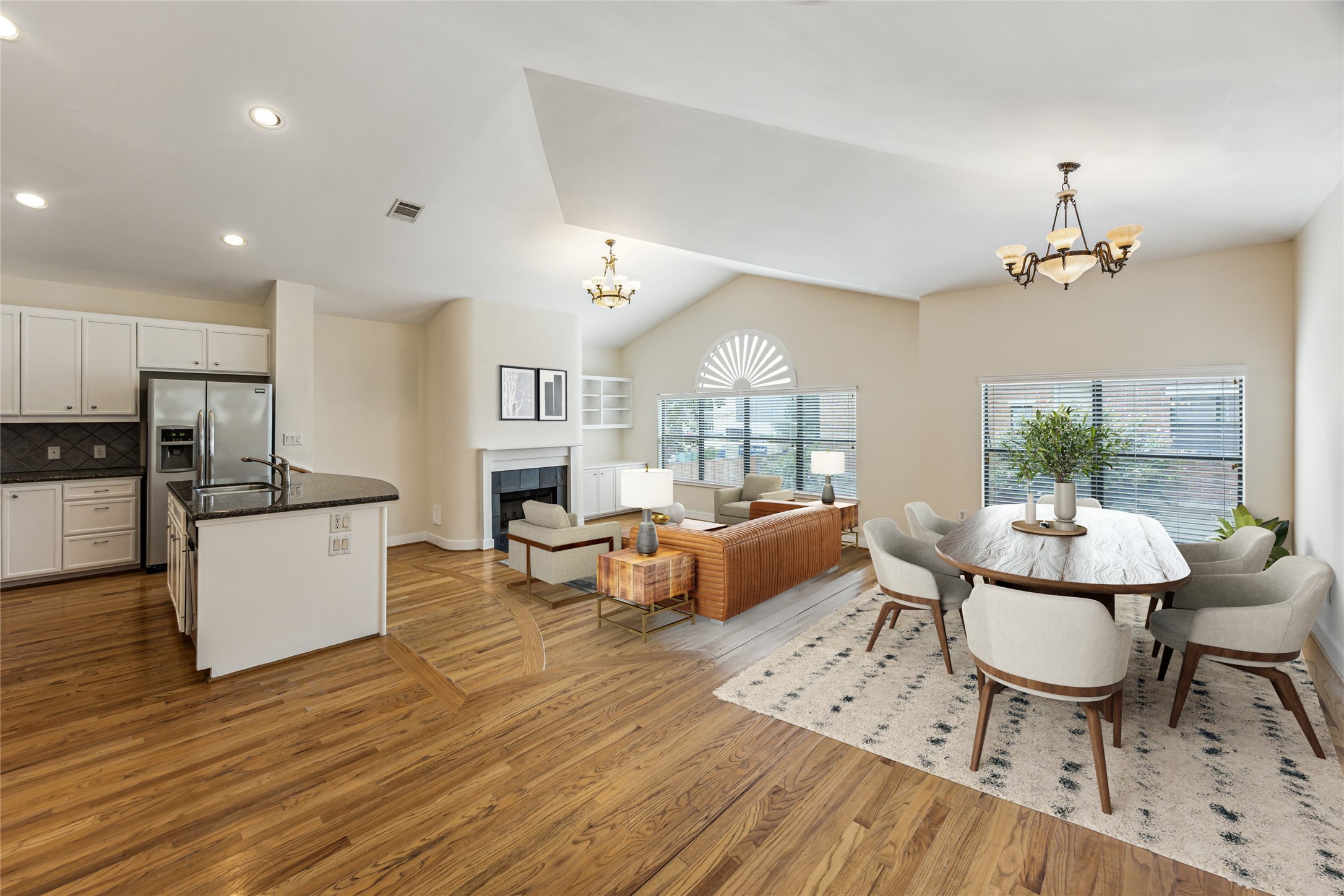 9829 Riddlelink Lane Houston, TX 77025 - Photo 2 of 22 **Virtually Staged** Generous sized combined living and dining space accented by high ceilings and oversized windows for a bright, airy feel.