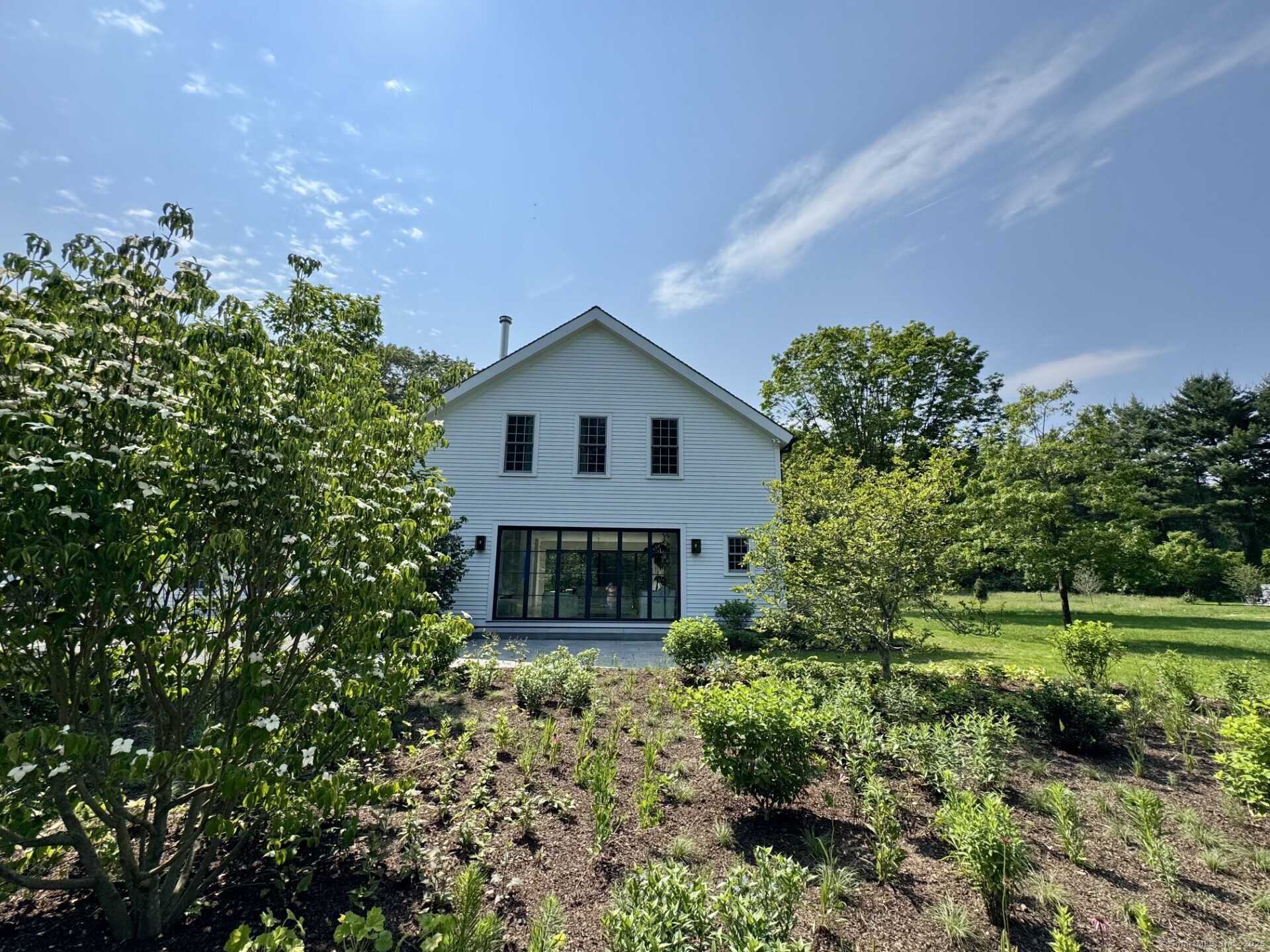 24 Old Roxbury Road Roxbury, CT 06783 - Photo 23 of 38 a front view of a house with a yard