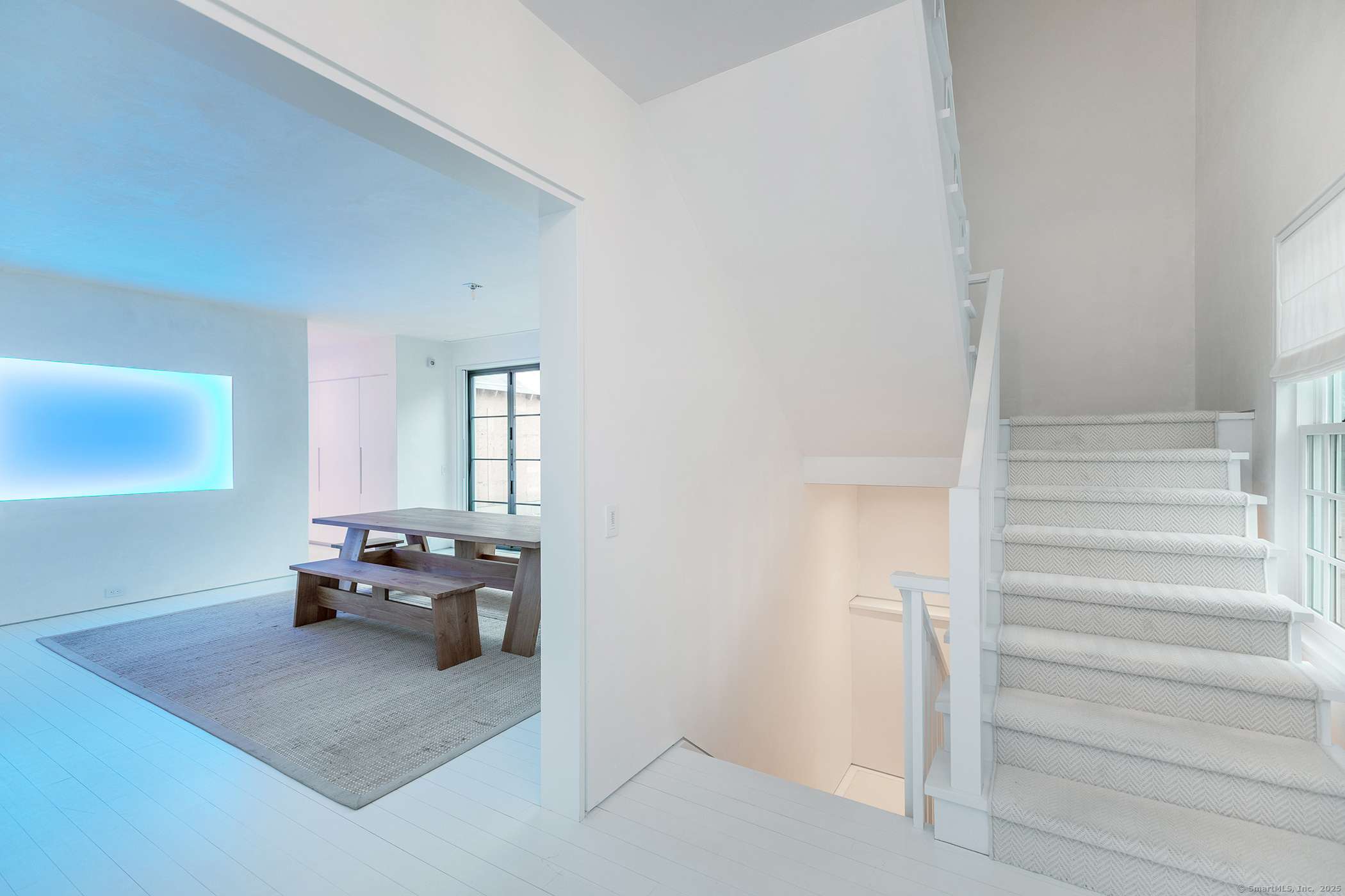 24 Old Roxbury Road Roxbury, CT 06783 - Photo 24 of 38 a living room with furniture and stairs