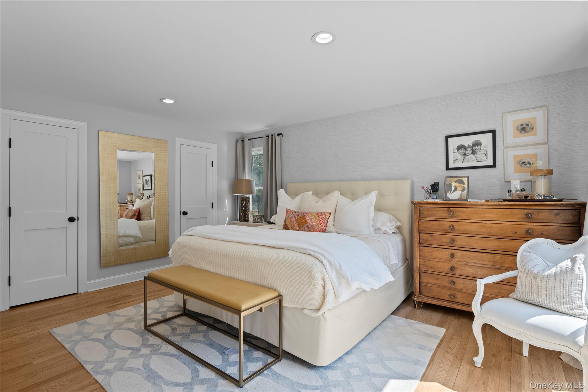 38 Pheasant Run Quogue, NY 11959 - Photo 16 of 35 a spacious bedroom with a bed and furniture