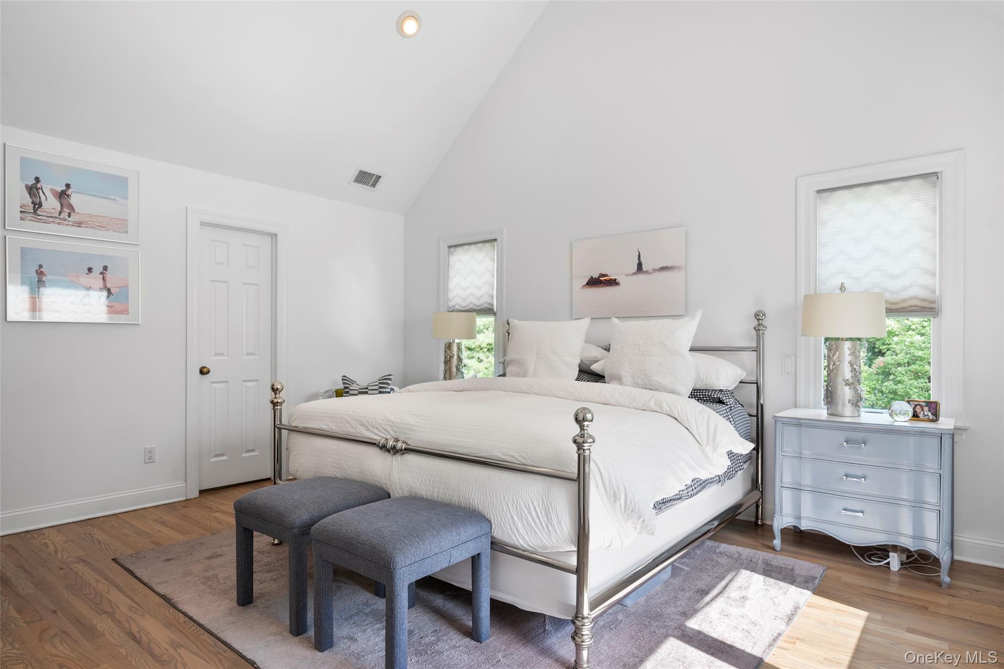 38 Pheasant Run Quogue, NY 11959 - Photo 19 of 35 a bedroom with a bed and a dresser